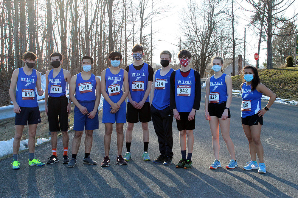 Wallkill’s cross-country team posing for a photo at the starting line of a March 9 meet hosted by the Highland Central School District. Pictured, from left to right, are Luke Diemoz, Jake Craypo, Luke Martini, Jack Simon, William Conklin, Daniel Lang, Josh Craypo, Lillian Glembocki and Maria Morales.
